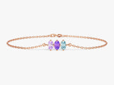 Rose gold bracelet with three marquise-cut gemstones