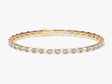 Emerald cut diamond tennis bracelet in yellow gold