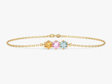 Gold chain bracelet with three colorful gemstones jewelry