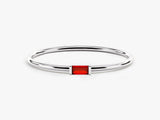 Silver ring with a rectangular red gemstone, jewelry design