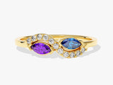 Gold infinity ring with marquise amethyst, sapphire, and diamonds