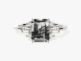 Rutilated quartz emerald cut ring with diamonds