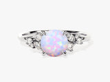 Oval opal and diamond engagement ring for jewelry company