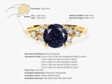 Gold ring with blue sandstone and diamond accents, jewelry details