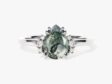 Pear-shaped moss agate ring with diamond accents