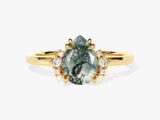 Gold ring with pear-shaped moss agate and diamond accents