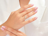 Diamond engagement ring on a woman's hand