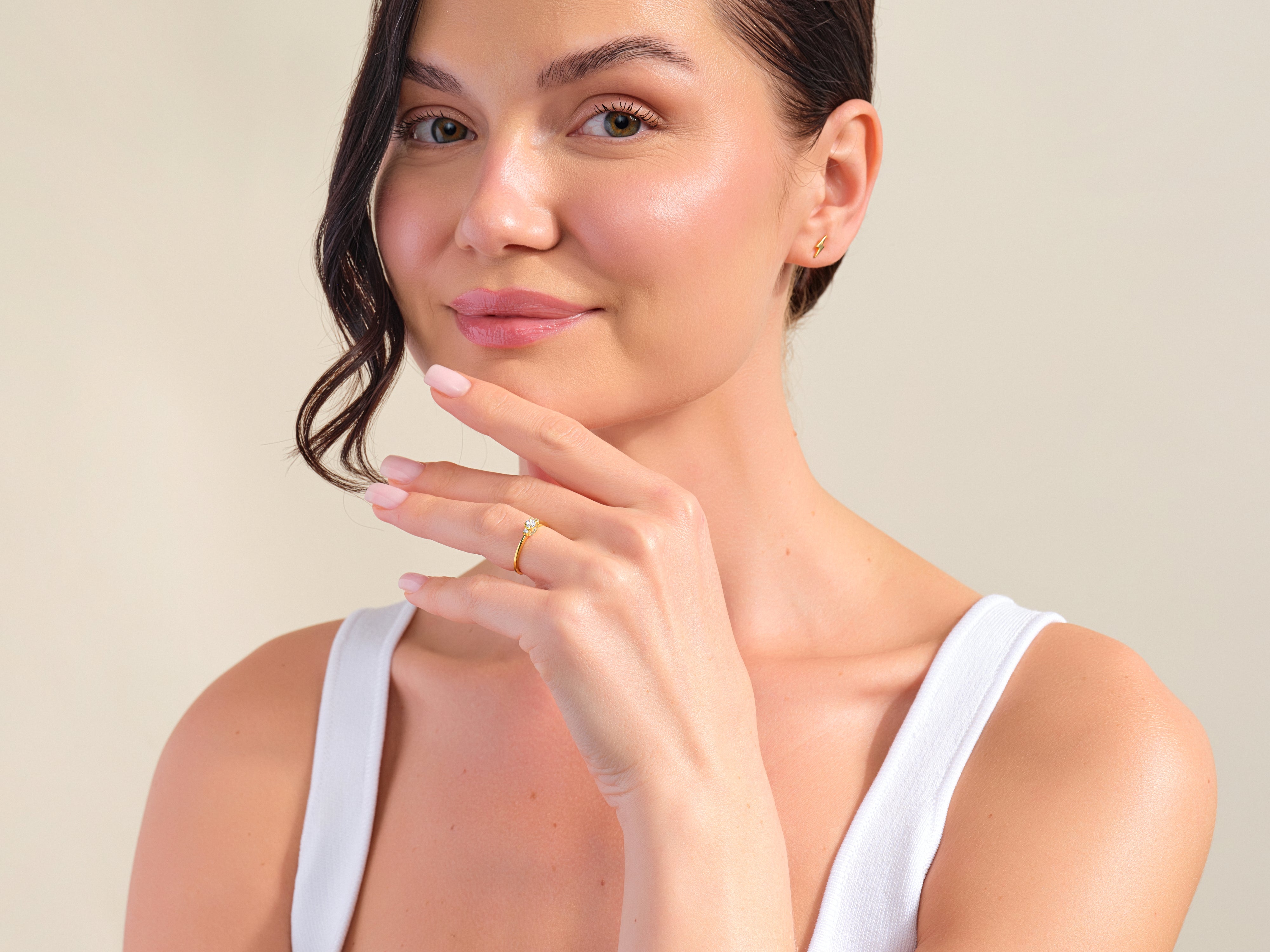 Diamond ring on a woman's hand, jewelry photography