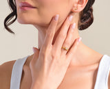 Gold diamond ring and lightning bolt earrings from jewelry brand