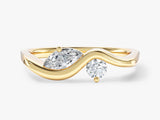 Gold ring with marquise and round diamonds