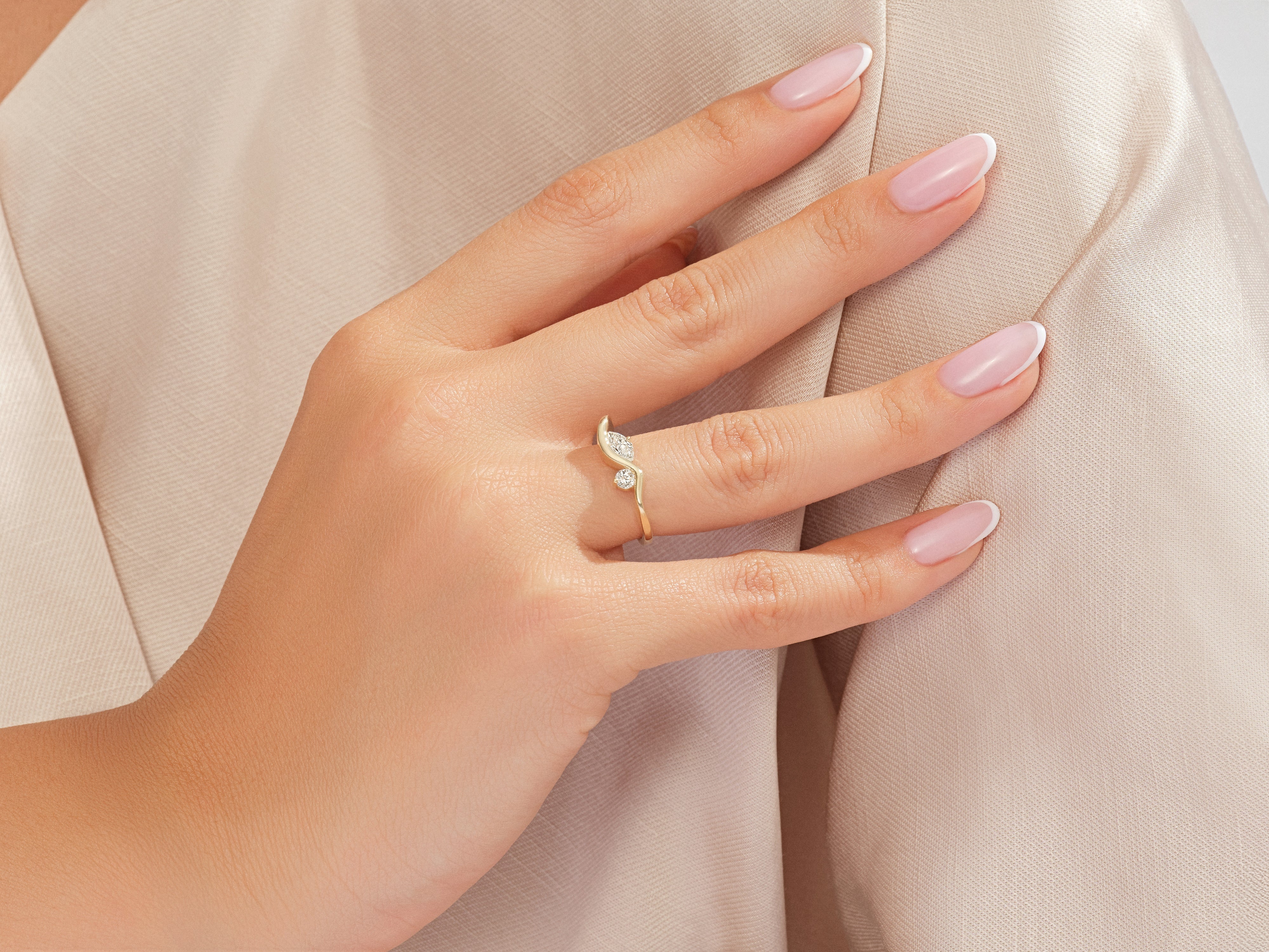 Diamond leaf ring on a woman's hand, fine jewelry
