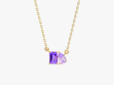 Gold necklace with emerald and pear cut purple gemstones